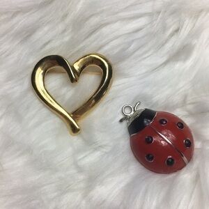 Stylized heart brooch, NWOT, 2”by 2”.